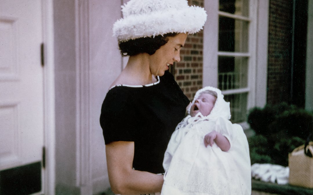 Mother holding her newborn baby in dedication of Mother's Day.